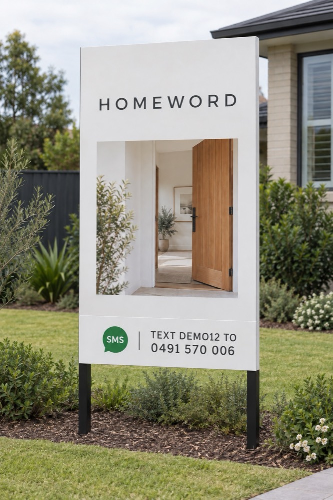 A board reading TEXT DEMO12 TO 0491 570 006 beside an SMS icon.